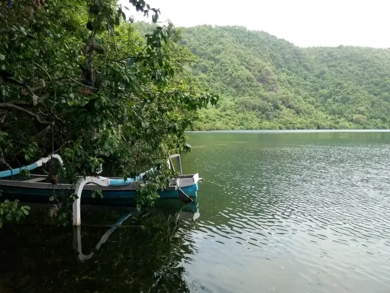Boat on the shore of Satonda crater lake