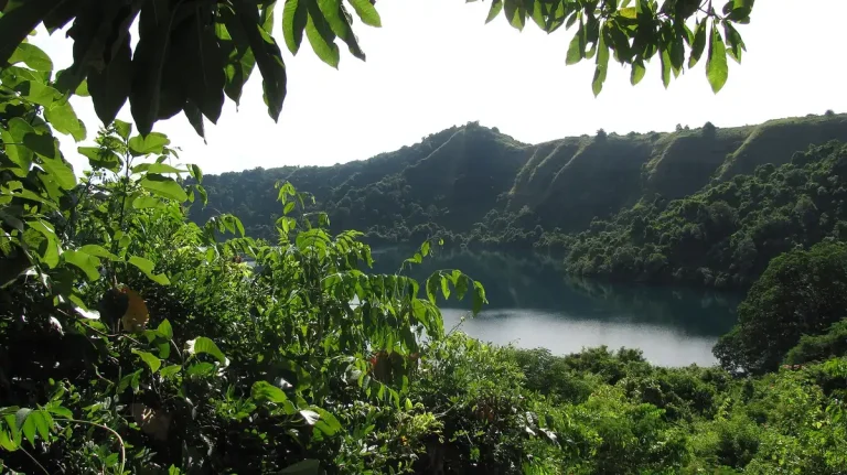 Satonda crater lake surrounded by forest