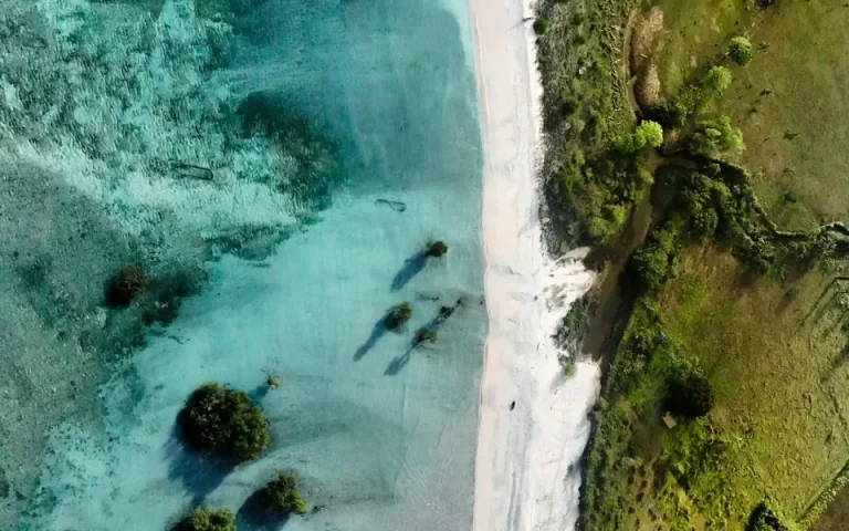 Aerial view of a white-sand beach in West Sumbawa