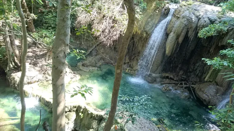 Mata Jitu waterfall pool in the forest of Moyo Island
