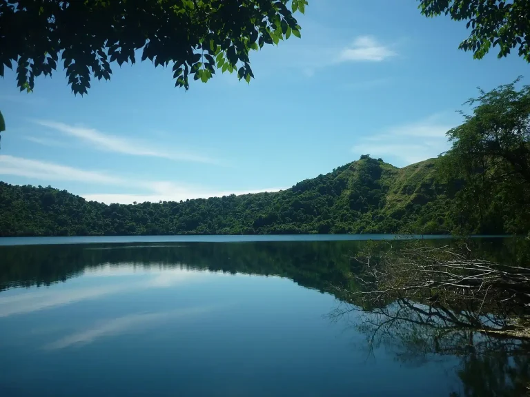 Satonda crater lake reflecting the forest